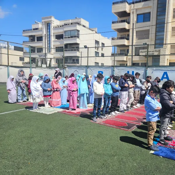 Students praying together at school