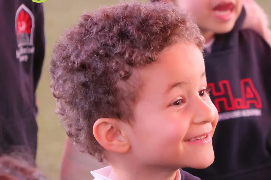 A happy BHA kindergarten pupil